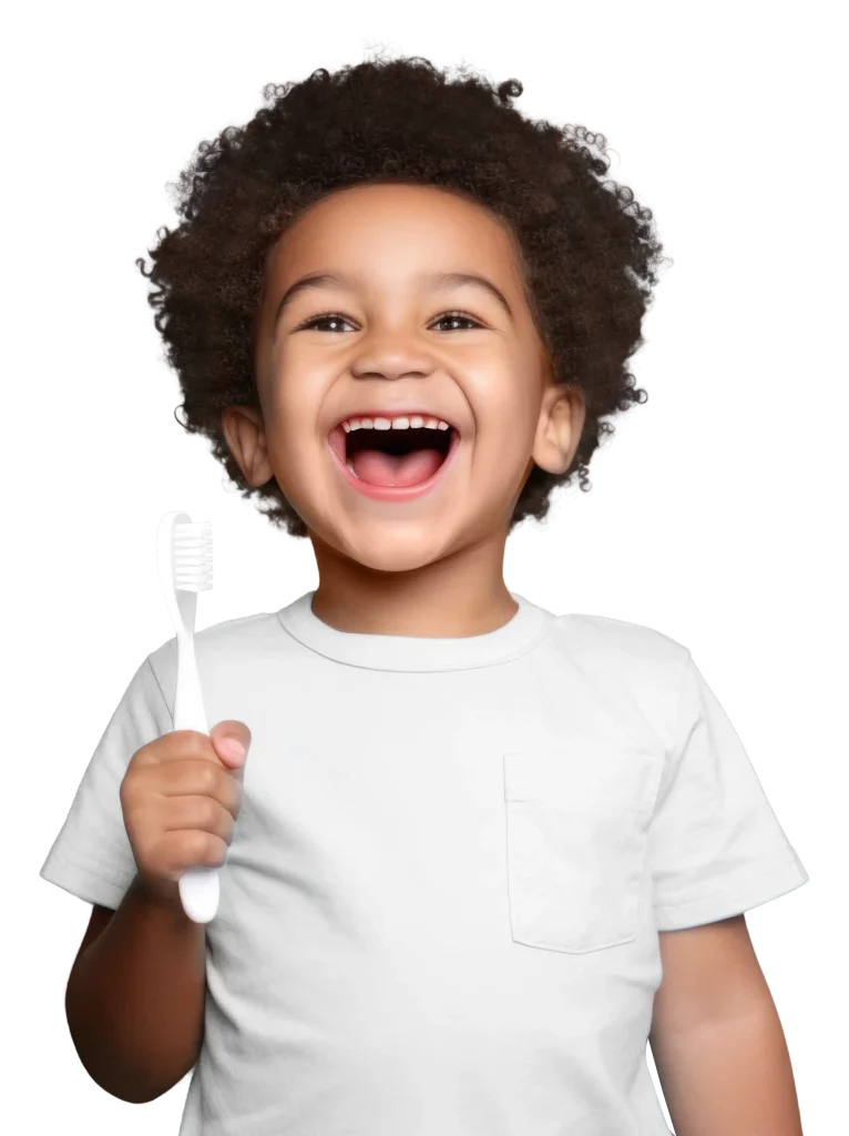 bambino felice con in mano uno spazzolino